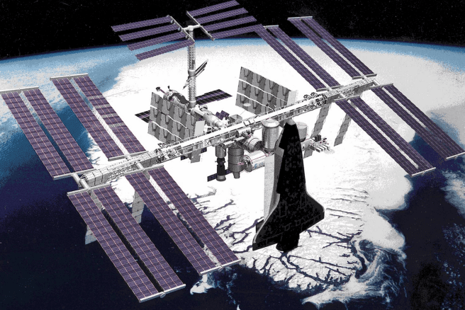 Space station with space shuttle attached